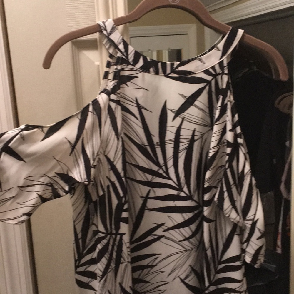 Cold shoulder. Short Drapey sleeve top.